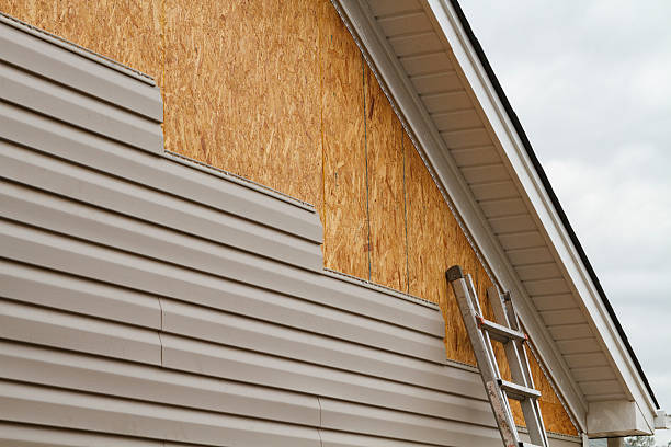 Professional Siding Contractor technician working in Revere, MA
